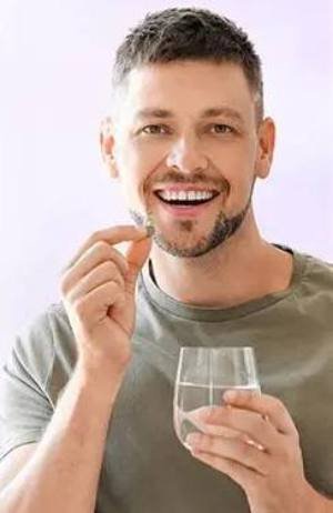 Middle-aged man sharing review of FlowForce Max prostate support supplement